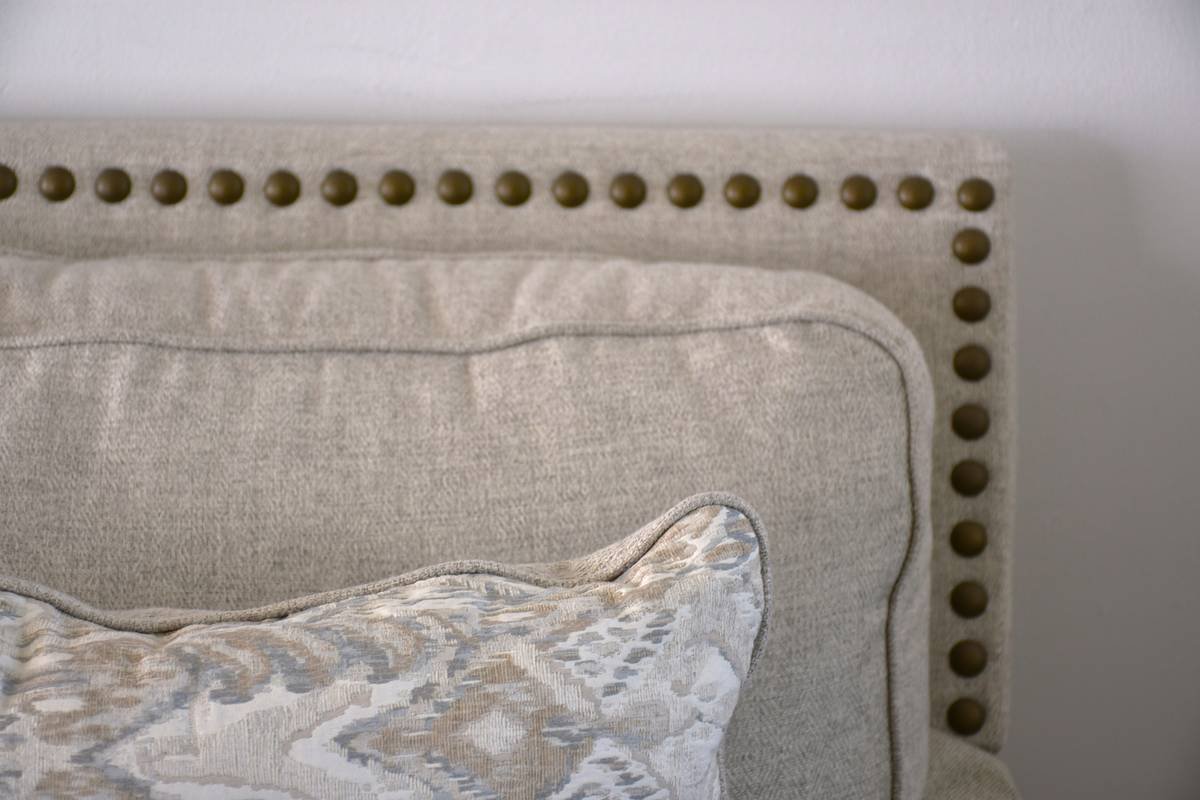 Bar chart showing 11.3% growth in high-end upholstered bed sales from 2022 to 2023, sourced from IBISWorld Furniture Industry Report